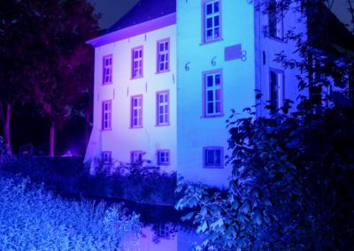 Gebäudebeleuchtung Wasserschloss Voerde in blau zur "LightItUp4HD" Kampagne